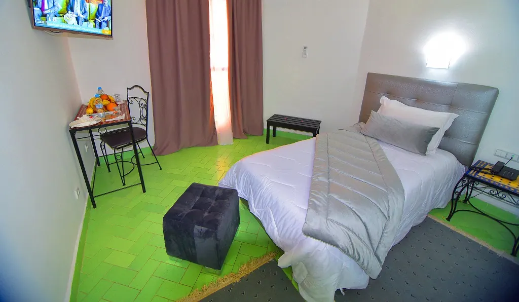 Les lits de la chambre triple de l’Hôtel Nouzha Fès